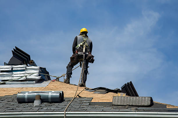 Professional Roof Replacement technician working in Hardin, MO